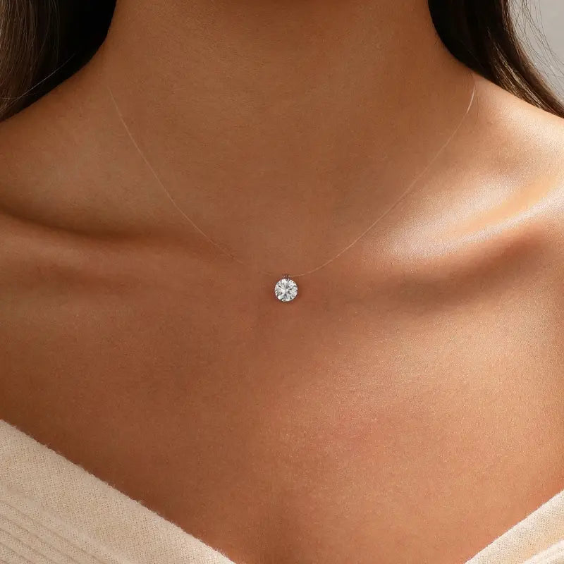 Circle crystal floating necklace worn at the neckline