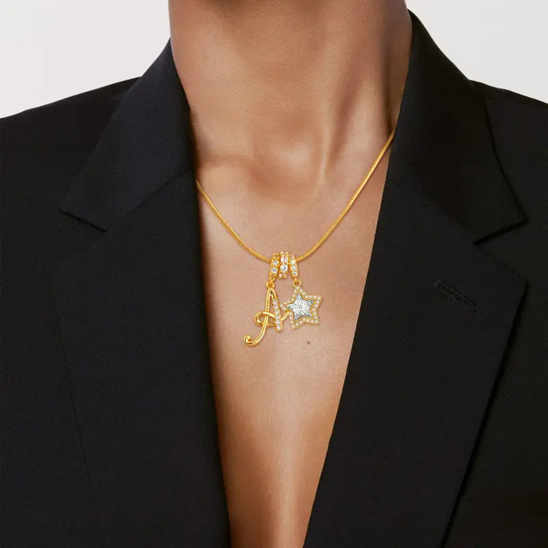 26-letter gold pendant with star decorations