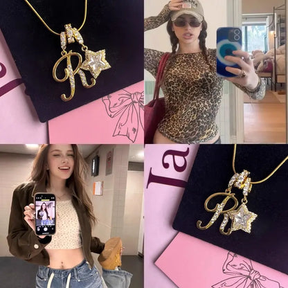 26-letter gold pendant with star decorations