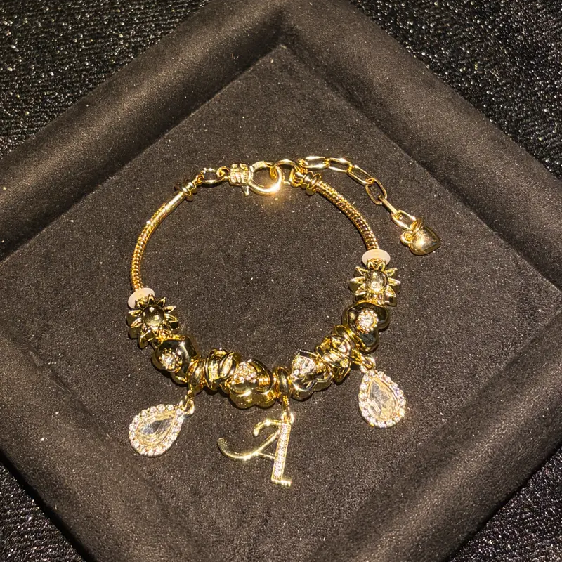 Gold Initial Letter Charm Bracelet with Sun & Crystal Accents