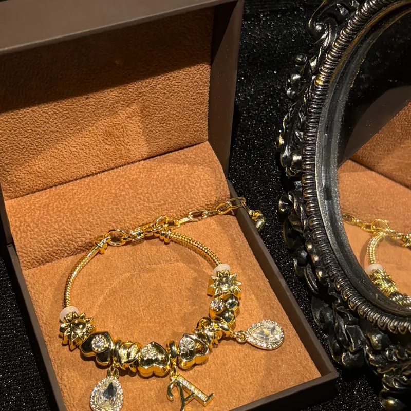 Initial bracelet displayed in jewelry box