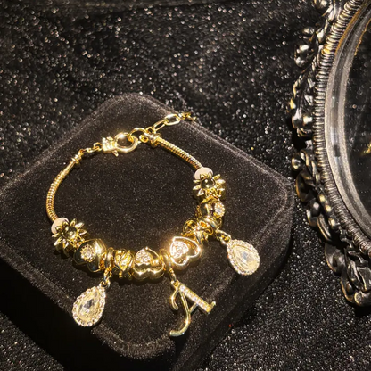 Gold Initial Letter Charm Bracelet with Sun & Crystal Accents