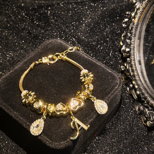 Gold Initial Letter Charm Bracelet with Sun & Crystal Accents